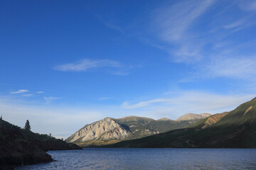incredible view on lake called windy arm, and surrounding mountains in canadian wilderness, path...