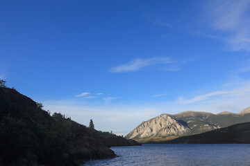 incredible view on lake called windy arm, and surrounding mountains in canadian wilderness, path...