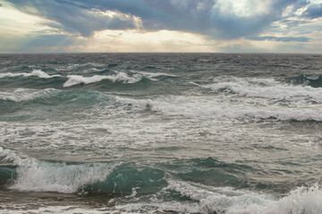 Ocean Waves At Sunset. Seascape. Copy Space.