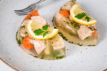 Fish in aspic with vegetables. Fish in jelly. Fish with gelatin.