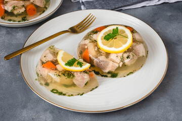 Fish in aspic with vegetables. Fish in jelly. Fish with gelatin.