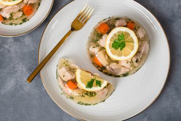 Fish in aspic with vegetables. Fish in jelly. Fish with gelatin.