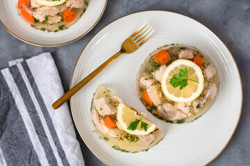 Fish in aspic with vegetables. Fish in jelly. Fish with gelatin.