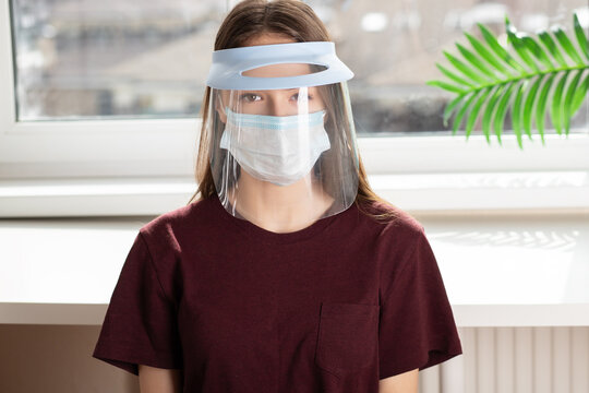 Plastic Protective Medical Visor Mask For Covid-19 Coronavirus On Nurse In Hospital