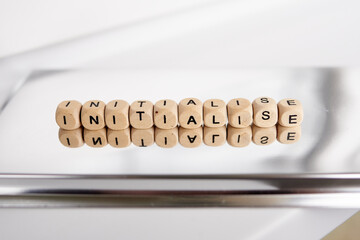 Word initialise made by wooden cubes