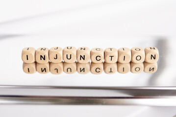 Word injunction made by wooden cubes