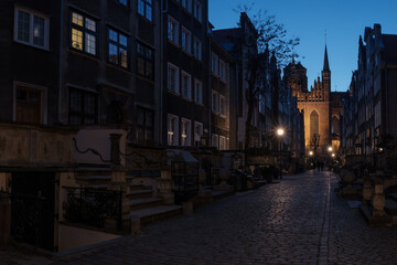 Night view of the gothic St. Mary's Church on Mariacka Street, Gdańsk, Poland.