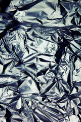 Foil background. Crumpled foil. Abstract background. Wallpaper