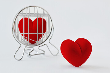 Heart looking in the mirror and seeing itself in a cage - Concept of love and freedom