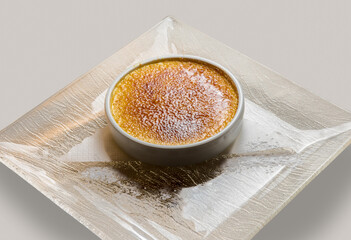 Catalan cream typical Spanish creme brulee on glass dish