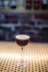 Glass of espresso martini cocktail.