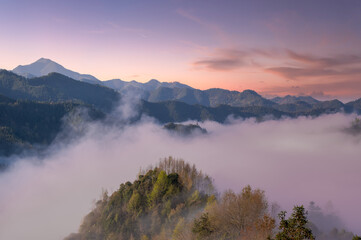 sea of clouds on mountains in sunrise