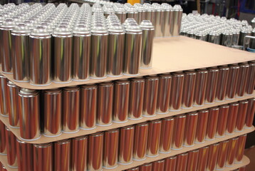 Aerosol can products being made in aerosol filling factory
