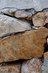 Arranged stone surface, rough wall texture background