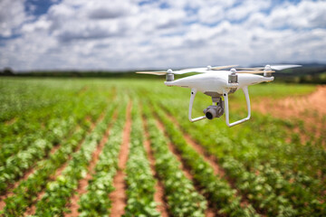 close up portrait of drone in field, smart farming concept