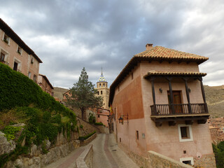 Fototapeta na wymiar Typical street of Albarracin, Teruel, Spain, in a cloudy day
