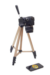 camera on tripod and smartphone