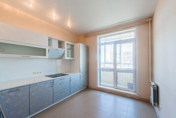 Russia, Moscow- April 25, 2020: interior room cozy. general cleaning, home decoration, preparation house for sale. kitchen and dining room, refectory area, cooking appliances, table furniture stove