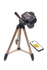 camera on tripod and smartphone