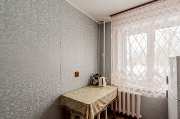 Russia, Moscow- April 25, 2020: interior room cozy. general cleaning, home decoration, preparation house for sale. kitchen and dining room, refectory area, cooking appliances, table furniture stove