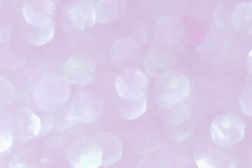 Shiny blurred purple background with bokeh for a festive mood. Greeting card template for fun.