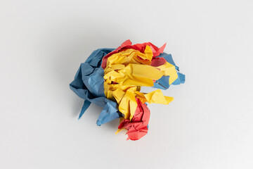 Crumpled wad of colored paper