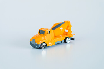 Fototapeta na wymiar Construction vehicles and heavy machinery.Industrial vehicles yellow mixer truck.
