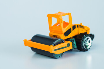 Construction vehicles and heavy machinery.Industrial vehicles yellow road roller.