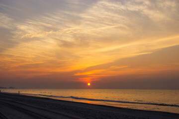 Fototapeta na wymiar Sunrise at the sea. Sunset on the ocean.