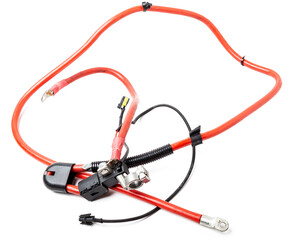 Automotive wiring harness with positive battery terminal and squib for disconnection in case of an accident. Vehicle security systems.