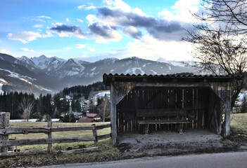 Fototapeta na wymiar Bus stop in Austrian alps near Schladming in spring