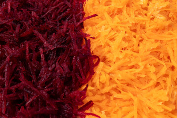 Texture with grated carrots and beets, side by side