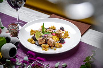 Roll stuffed with mushrooms and vegetables with berry sauce