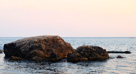 Huge boulders on the shores of a small bay of the Black Sea.