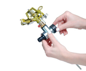 lawn sprinkler in hand on white background isolation