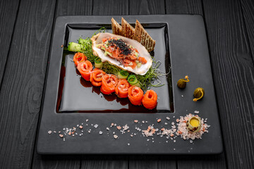 Salmon tartare with fresh vegetables and toast