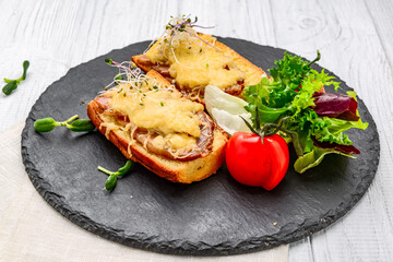 French toast ham cheese and salad on dish
