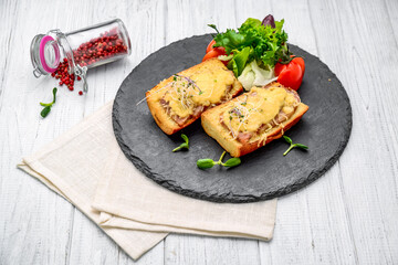 French toast ham cheese and salad on dish