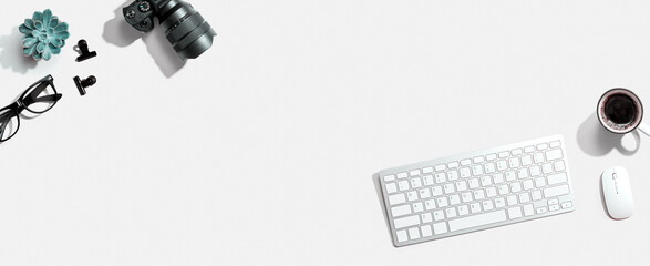 Computer keyboard and SLR camera - obrazy, fototapety, plakaty