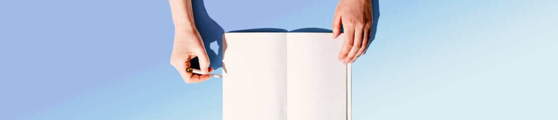 Person writing in a notebook