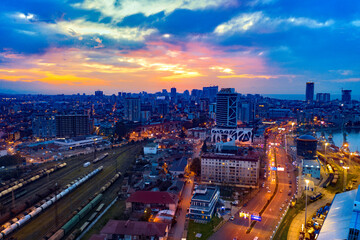 Fototapeta na wymiar City lights on the background of a beautiful sunset