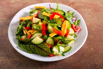 Fried egg and vegetable salad