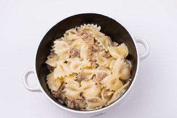 pasta with minced meat on a plate. Russian national Soviet dish