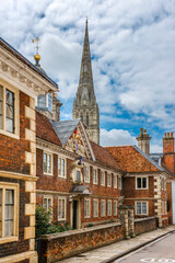 Salisbury Cathedral spire with 17th century alms houses in foreground taken in the High Street, Salisbury, Wiltshire, , England