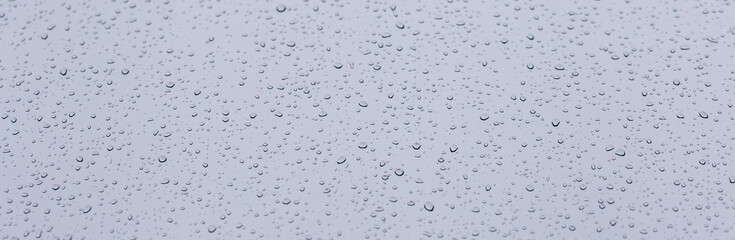 rain water drops on blue background