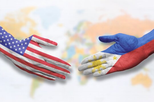 Philippines and USA - Flag handshake symbolizing partnership and cooperation with the United States of America