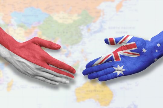 Indonesia and Australia - Flag handshake symbolizing partnership and cooperation