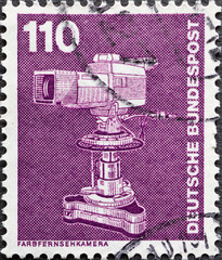 GERMANY - CIRCA 1982 : a postage stamp from Germany, showing a motif from industry and technology. Color television camera
