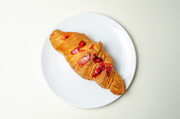 Croissants with strawberries and chocolate. High quality photo