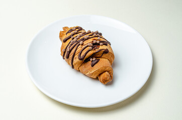 Croissants with strawberries and chocolate. High quality photo